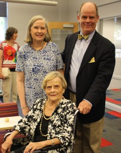 Marie Gallagher, seated center, attended the dedication. She served as assistant librarian for 20 years. "Kids will want to be in here."