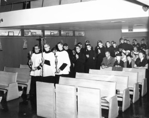 Novices from the class of 1955 making their first vows in the Viatorian chapel