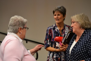 Associates Marilyn Mulcahy, Connie Gerber and Donna Schwarz make their points