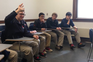 Saint Viator students ask questions during a master class