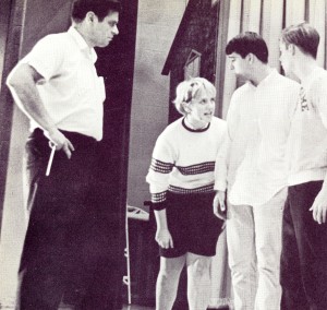 J.J. Stamm, left, directs students in Saint Viator's first musical in 1967