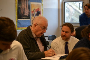 Mr. Kurt Paprocki, right, works with his newest freshman, Fr. Charles Bolser 