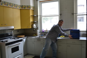 Br. Michael Gosch works to set up the kitchen