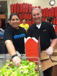 Pre-Associate Deborah Perez and Br. Rob Robertson, CSV, work together at the food bank