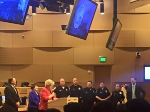 Associate Paul Hartz, fifth from the left, was honored by Las Vegas Mayor Carolyn Goodman