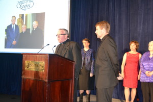 Fr. Thomas von Behren, CSV, thanks Fr. Corey Brost, CSV, for his leadership as president of Saint Viator High School