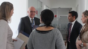 Fr. Albeyro Vanegas, CSV, rector of the school, shows officials from the IB accreditation team around the school 
