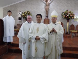 Fr. Thomas von Behren, left, Br. Fredy Contreras, center and Msgr. Misael Vacca Ramirez, right