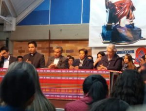 Br. Juan Carlos Ubaque, CSV, far left; Br. Fredy Contreras, CSV, second from left; and Fr. Pedro Herrara, CSV, center, attend the meeting on Sept. 6, 2016 that announced the transfer of ownership to school families