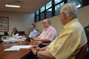 Fr. Lawrence Lentz, CSV, right, at a meeting of the Viatorian Community Council