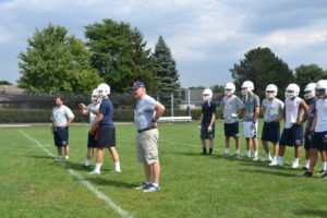 Fr. Hall runs the special teams through their drills