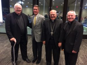 Fr. Thomas von Behren, CSV, right, appears with (L-R) Fr. John Foley, S.J., John Killduff, and Bishop Joseph Pepe at the Oct. 5 news conference