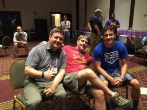 Fr. Jason Nesbit, left, enjoys a moment with Fr. Corey Brost, center, and one of the delegates at the Viatorian Youth Congress