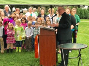 Fr. Thomas von Behren, CSV, addresses children and their parents about the Viatorian commitment to young people and their faith formation