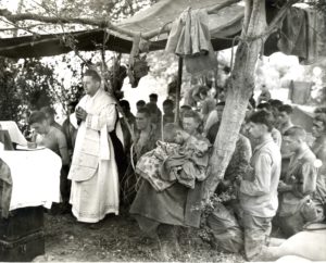 Fr. Charles Riedel leads Marines at Mass in Saipan during World War II