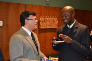 Br. Carlos Flórez, CSV, and Fr. Dudley Pierre, CSV, of Haiti, during a dinner after the Extraordinary General Council meeting in 2013