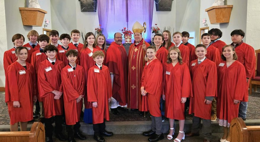 Fr. Dan Belanger Graduating with his Confirmation Students